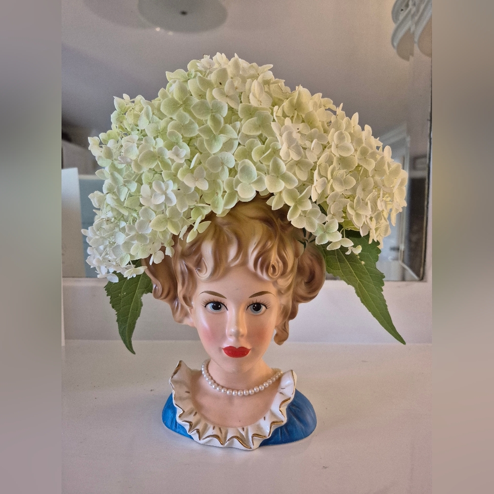 Charming Ceramic Bust with Blonde Hair and Blue Base